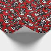 赤い背景のスケルトン ラッピングペーパー (角)