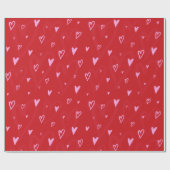 赤い背景の可愛いピンクのハート ラッピングペーパー (フラット)