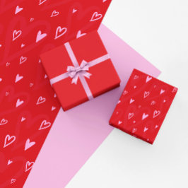 赤い背景の可愛いピンクのハート ラッピングペーパー