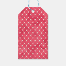 赤い背景の白いハート ギフトタグ