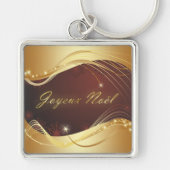 赤い背景を持つ金色のクリスマスの動機… キーホルダー (正面)