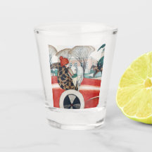 赤い自動車の中で女の子とパグ犬