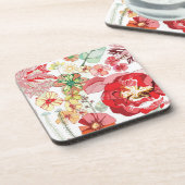 赤い花が付いているパターン コースター (左側)