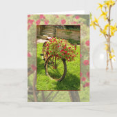 赤い花プランターにリサイクルされる古い自転車 カード (黄色い花)