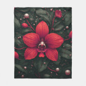 赤い蘭の花と緑の葉 フリースブランケット (正面)