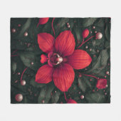 赤い蘭の花と緑の葉 フリースブランケット (正面(横))