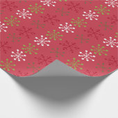 赤い裏地を持つ赤い白い緑のスノーフレーク ラッピングペーパー (角)