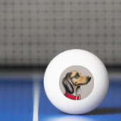 赤い襟を横に置いた優雅な犬 卓球ボール (ネット)