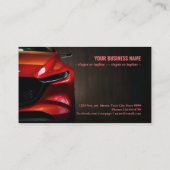 赤い車のヘモダンッドライトが黒の背景に点灯 名刺 (裏面)