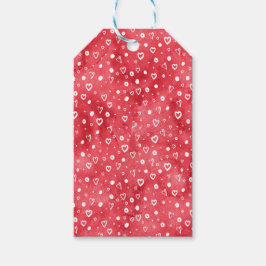 赤い飛沫の背景に白いハート ギフトタグ