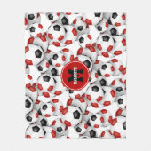 赤い黒いサッカーボールのチームカラーモノグラムの フリースブランケット (正面)