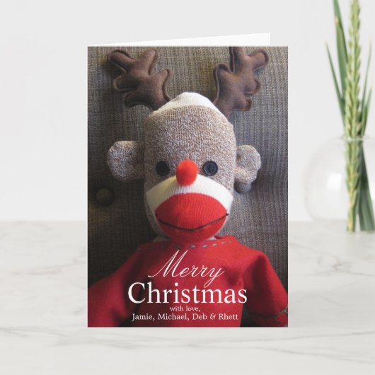 赤い(雄ジカの)枝角を搭載するソックス猿の顔のクローズアップ シーズンカード (正面)