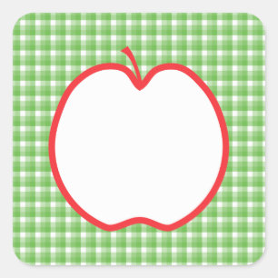 赤いApple。 緑および白い点検の背景を使って スクエアシール