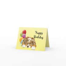 赤いMerleのオーストラリアの子犬のハッピーバースデー