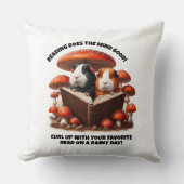 赤おもしろいい読キノコの下のモルモット クッション (正面)