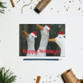 赤おもしろいサンタ帽をかぶった白アヒル シーズンポストカード