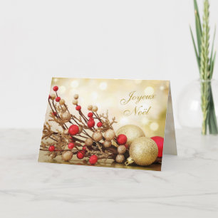 赤および金ゴールドのつまらないもののJoyeux Noëlのフランス人のクリスマス シーズンカード