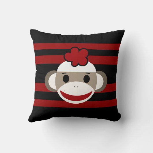 赤くおよび黒くストライプのなソックス猿の女の子の花の帽子 クッション (裏面)