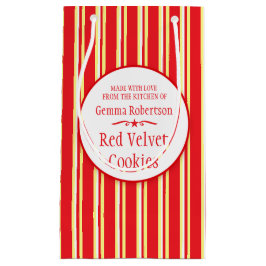 赤く白い黄色のストライブ柄のクッキーの交換のベーキングは袋に入れます スモールペーパーバッグ