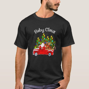 赤ちゃんクラウス運転するサンタのクリスマスツリーとトナカイのピックアップ Tシャツ