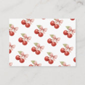 赤ちゃんシャワー用のトップブック上のピンクボウレッドさくらんぼ エンクロージャーカード (裏面)