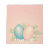 赤ちゃんブルーとピンクのイースターエッグと春フローラ ノートパッド (正面)