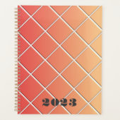 赤とオレンジの四角いグリッド（グラデーション付き） – 任意の年 プランナー手帳 (正面)