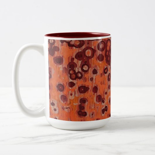 赤とオレンジの幾何学的 ツートーンマグカップ (左)
