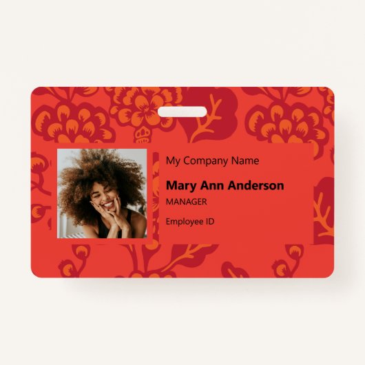 赤とオレンジ鮮やかと花はっきりした柄が悪い バッジ (正面)