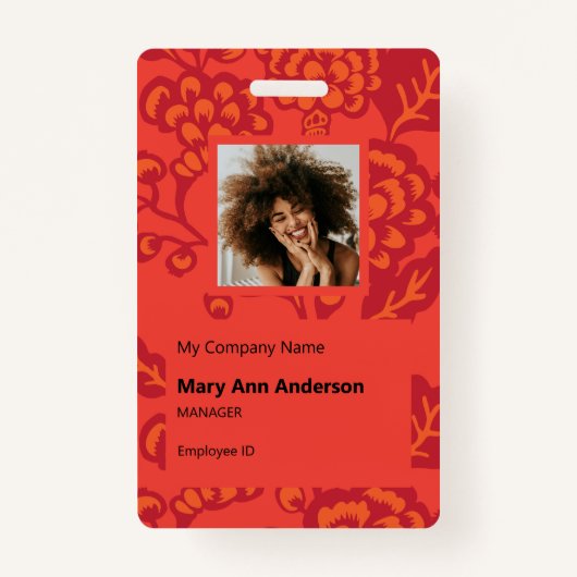 赤とオレンジ鮮やかと花はっきりした柄 バッジ (正面)