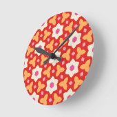 赤とピンクの幾何学的な花模様にモダンな花 ラウンド壁時計 (傾斜)