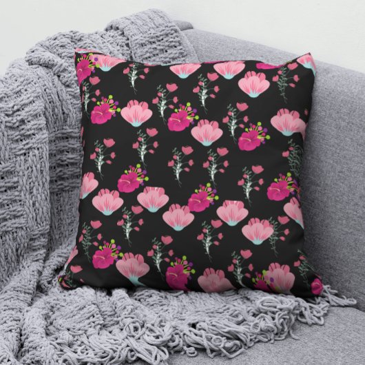 赤とピンクの花が黒に模様を付ける クッション