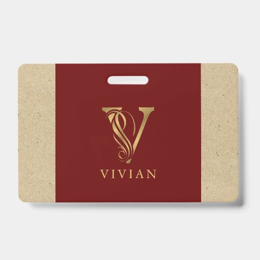 赤と段ボールにゴールドの筆記体Vのモノグラム バッジ (表面)