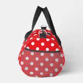 赤と白の水玉模様のダッフルバッグ ダッフルバッグ (右)