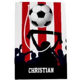 赤と白ストライプサッカーのファン ミディアムペーパーバッグ (正面)