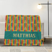 赤と緑のレトロラクロススティックとストライプ フリースブランケット