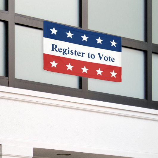 赤と青を星で投票に登録 横断幕 (ビルの外側)
