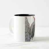 赤によって膨らまされるキツツキ ツートーンマグカップ (正面左)