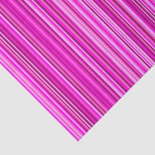赤またはピンクの着色されたさまざまな色合いを縞で飾りますか、または並べます 薄葉紙 (詳細)
