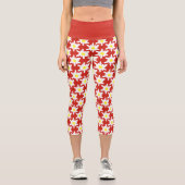 赤を基調としたエーデルワイスのホワイトフラワーパターン カプリレギンス (正面)