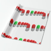 赤ユニークカプセルの中の緑の錠剤 ラッピングペーパー (アンロールド)