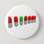 赤ユニークカプセルの中の緑の錠剤 缶バッジ (正面)