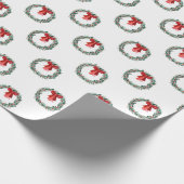 赤伝統的いおじぎの贈り物を持つクリスマスリース ラッピングペーパー (角)