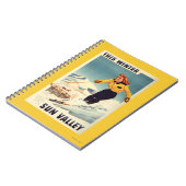 赤毛女性の笑顔とスキーのポスター ノートブック (左側)