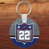 赤白と青のアメリカンフットボールのチームスポーツ キーホルダー (正面)