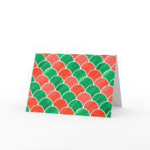 赤色彩の鮮やかと緑のスケールのクリスマスパターン