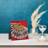 赤華美い背景にハンドヘルドファン フォトプラーク (インサイチュ)