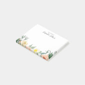 赤面ピンクの水色の花の机から ポストイット (アングル)