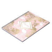 赤面ピンクの白金ゴールド王室のクジャク ノートブック (左側)
