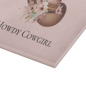 赤面ピンクハウディ女性のカーボーイフローラウエスタンハッツ カッティングボード (角)